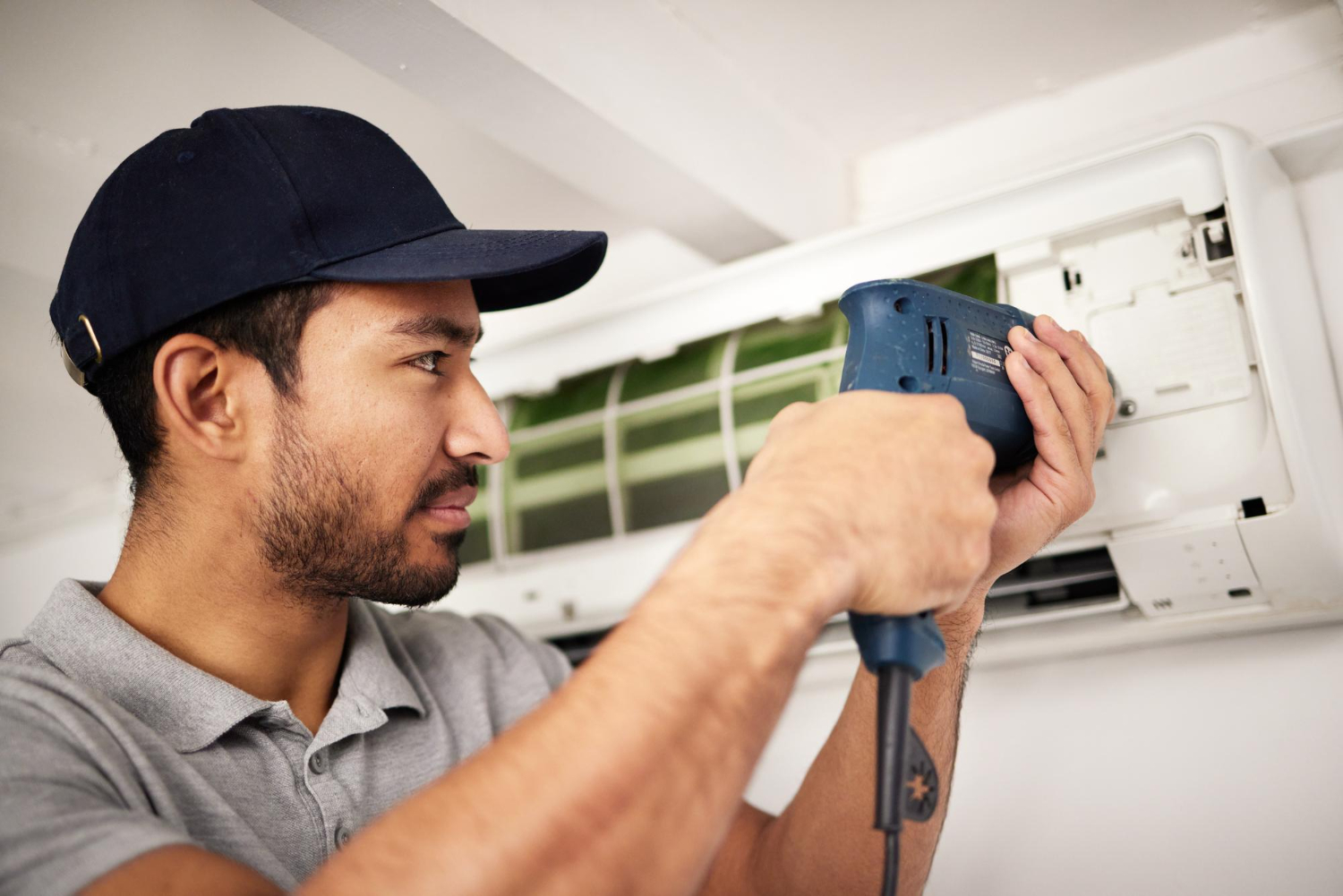 HVAC repair technician at work